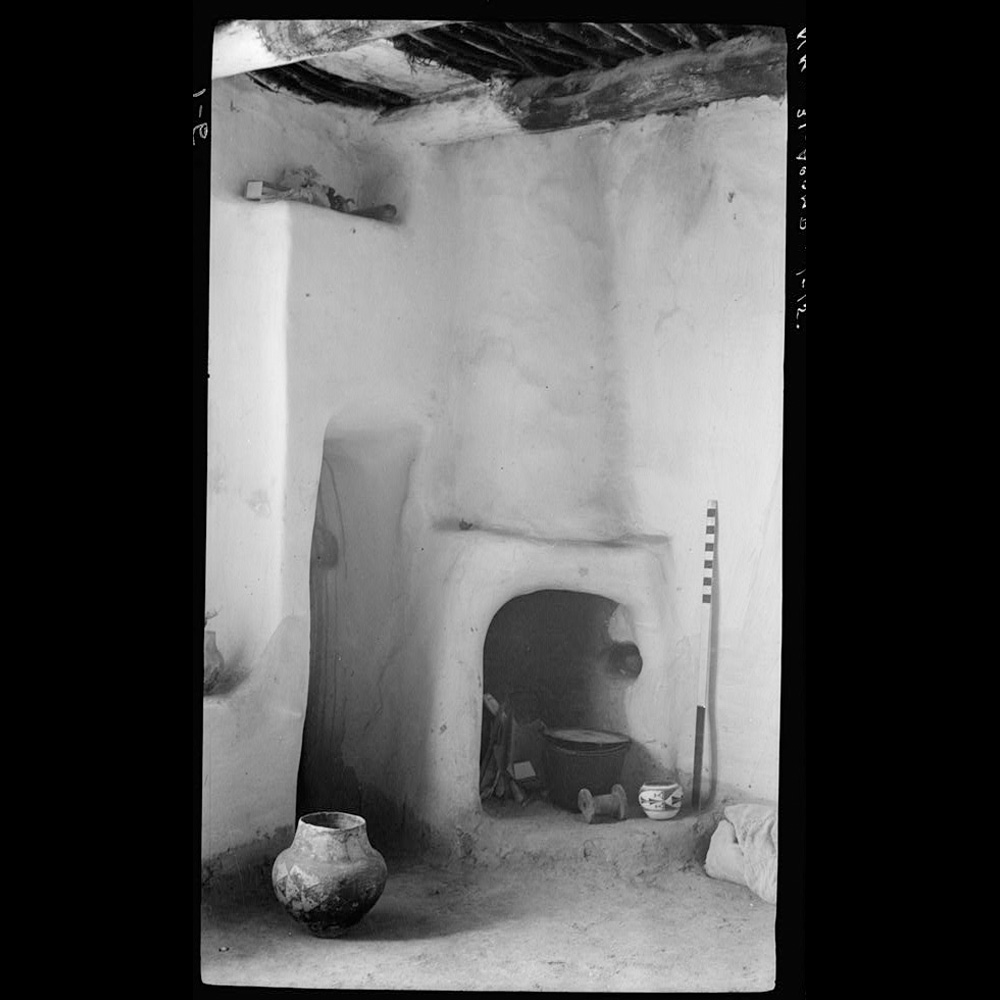 Photograph of pueblo building cooking hearth.