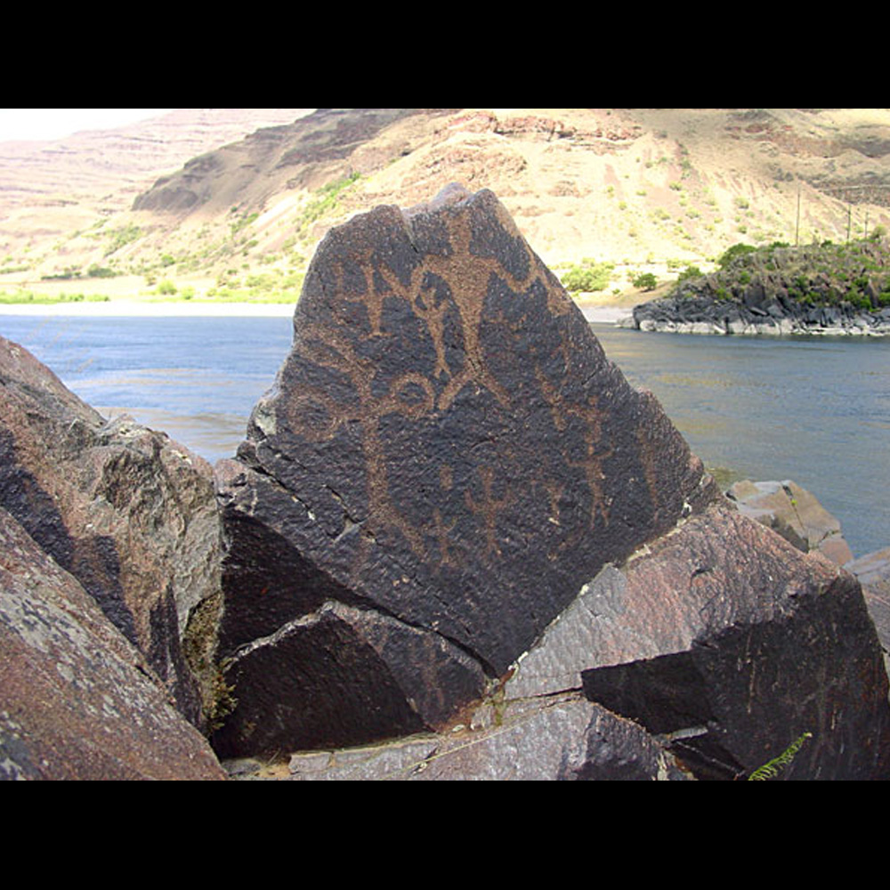 Petroglyph of various humanoid forms.